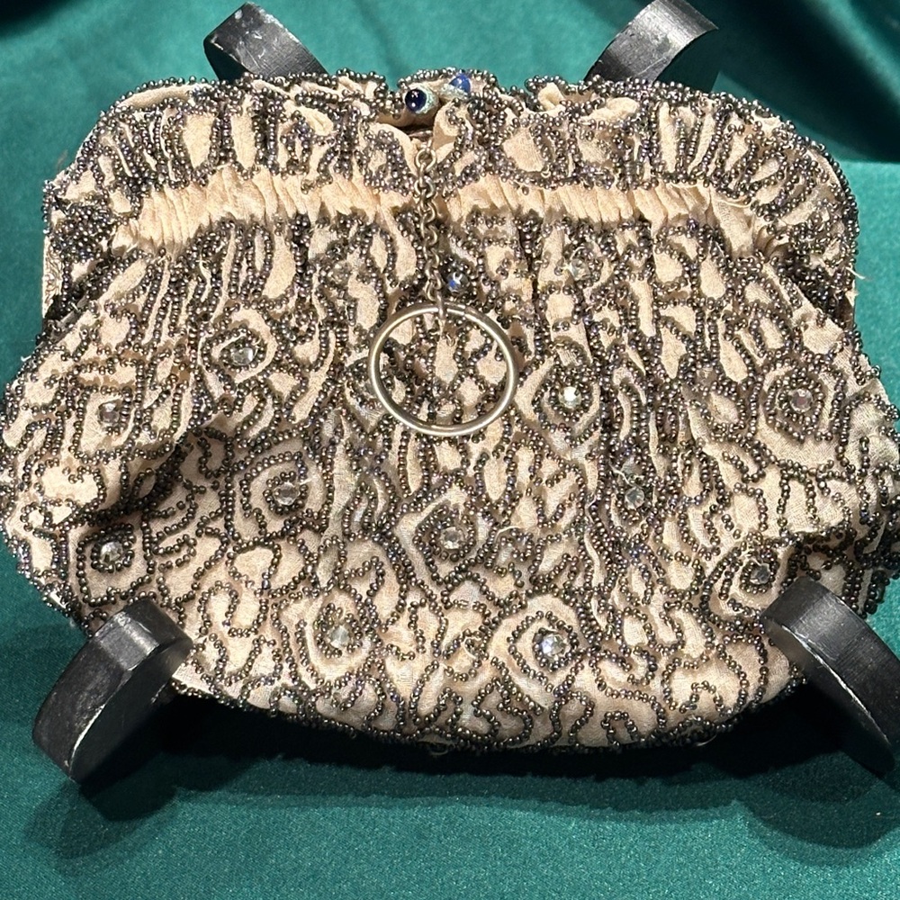 Vintage hand-beaded clutch from Belgium with rhinestones and sapphire closure.